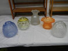 5 glass oil lamp shades in good condition.