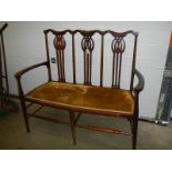 A mahogany 2 seater window seat.