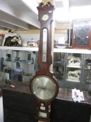 A Victorian barometer in good condition.
