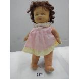 A vintage cloth doll.