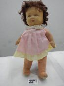 A vintage cloth doll.