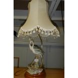 A good quality mid - late 20th century Capodimonte table lamp being figures of storks,