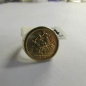 A 1906 half sovereign ring in 9ct gold mount, size W. 11 grams.