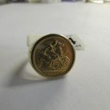 A 1906 half sovereign ring in 9ct gold mount, size W. 11 grams.