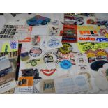 A large quantity of car stickers etc.