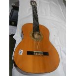 A Hohner MC-05 classical guitar.