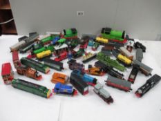 Box containing various ERTL Thomas Tank series vehicles