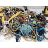 A large quantity of unsorted costume jewellery,