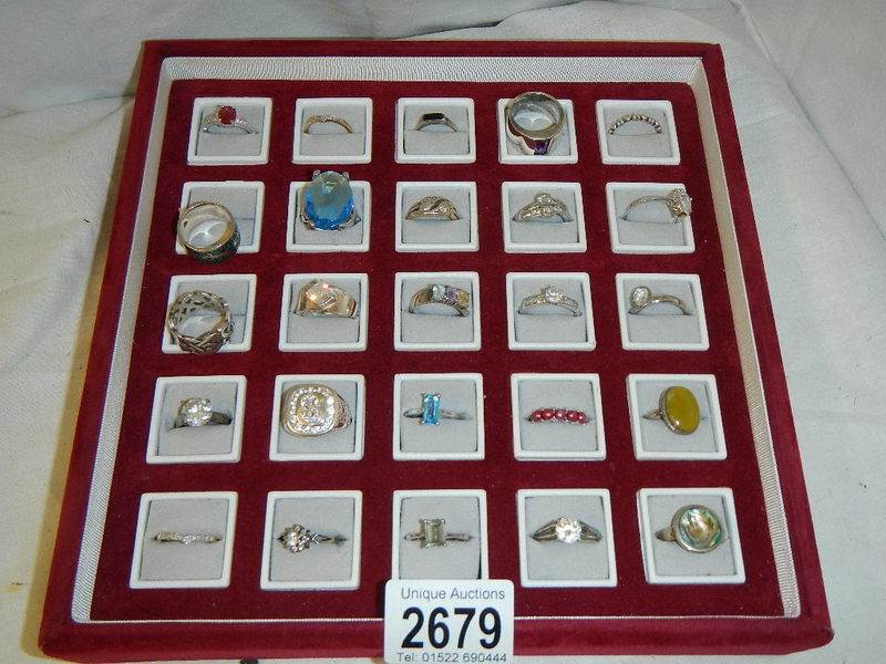 25 good silver rings all marked 925.