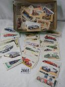 A quanitty of assorted cigarette and collector's cars of vintage cars including Black Cat,