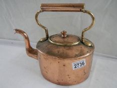 A Victorian oval copper kettle.