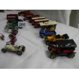 A quantity of early Lesney Yesteryear models including Trams, buses etc.