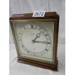 A mid 20th century Elliot mantel clock by W.H.May, Nottingham.