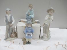 4 NAO figures including Boy with Duffle Coat and Dog, Boy with Duffle Coat and Rabbit (with box),