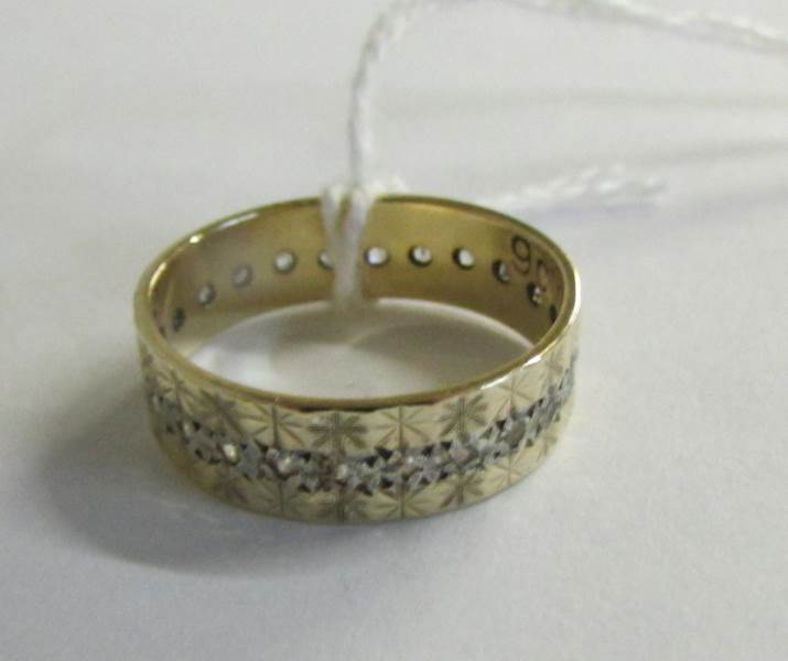 A circa 1970's textured wedding band, stone set, stamped 9ct. - Image 3 of 3