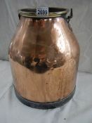 A copper milk churn.