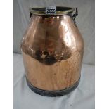 A copper milk churn.