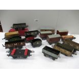 Box containing various tin plate railway carriages and rolling stock