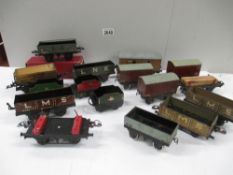 Box containing various tin plate railway carriages and rolling stock