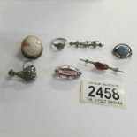 A mixed lot of vintage silver jewellery including watering can, ring, brooches etc.