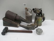 Box containing blow torch,