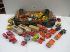 Box containing various Lesney Matchbox die cast models