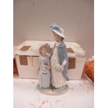 A large NAO figure group of a Mother and Daughter in Sunday Best (with box)