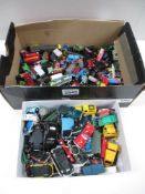 Box containing various miniature train and vehicle toys and various car themed keyrings