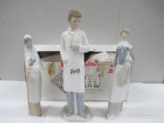 3 NAO figures including Doctor (with box), Lady with head scarf,