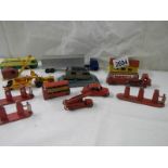 A quantity of early Lesney matchbox models including petrol pumps, garage etc.