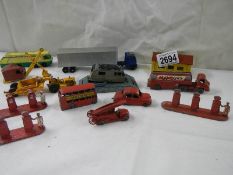 A quantity of early Lesney matchbox models including petrol pumps, garage etc.