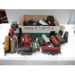 Box containing various incomplete tin plate railway engines carriages and rolling stock