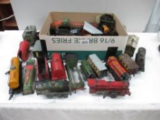 Box containing various incomplete tin plate railway engines carriages and rolling stock