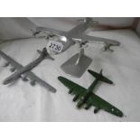 2 cast "Heavy Bomber" planes and an aluminium plane on stand, 1 a/f.