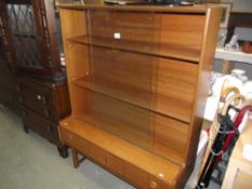 A retro glazed door bookcase wall unit with 2 drawers