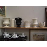 A quantity of planters/vases/urns including Sylvac, Wedgwood etc.