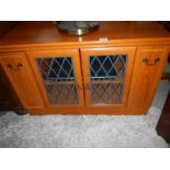 A mahogany television cabinet.