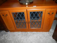 A mahogany television cabinet.