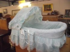 A wicker babies crib