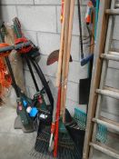 A large quantity of tools including strimmer.