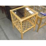 A glass top bamboo table