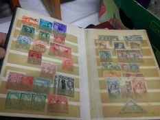 10 small albums of stamps.