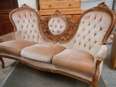 A good 20th century triple balloon back settee.