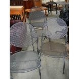 A set of 4 metal folding garden chairs.