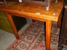 An old oak draw leaf table.