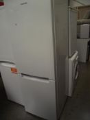 A Samsung fridge freezer (some dents to door)