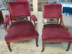 A pair of Grandmother/Grandfather inlaid chairs in good condition.