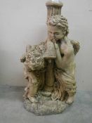 A double cherub garden ornament. 31".