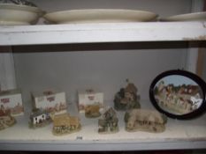 3 Lilliput lane cottages with boxes & a quantity of David Winter cottages etc.