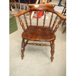 A good old spindle back kitchen arm chair,